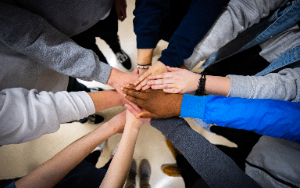 All hands in the middle.